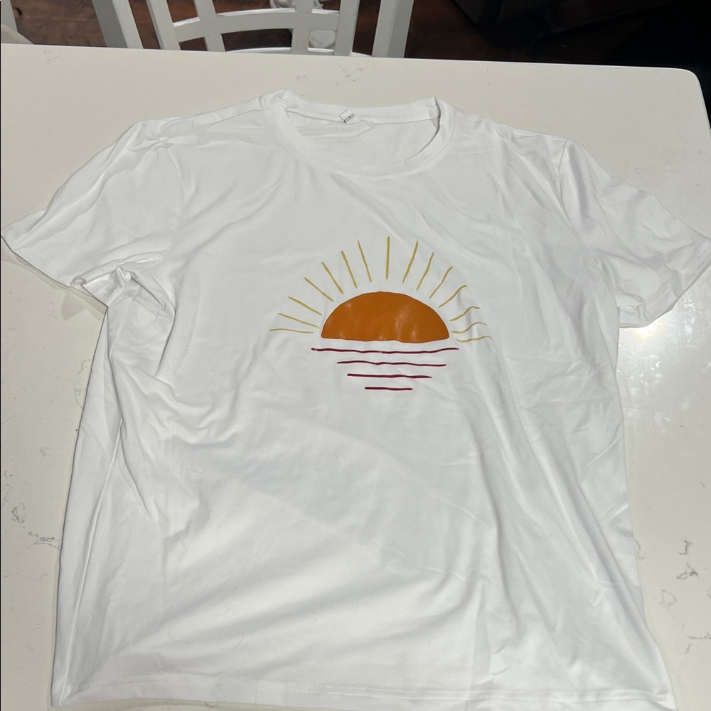 SHEIN White Tee with Orange Sun Design